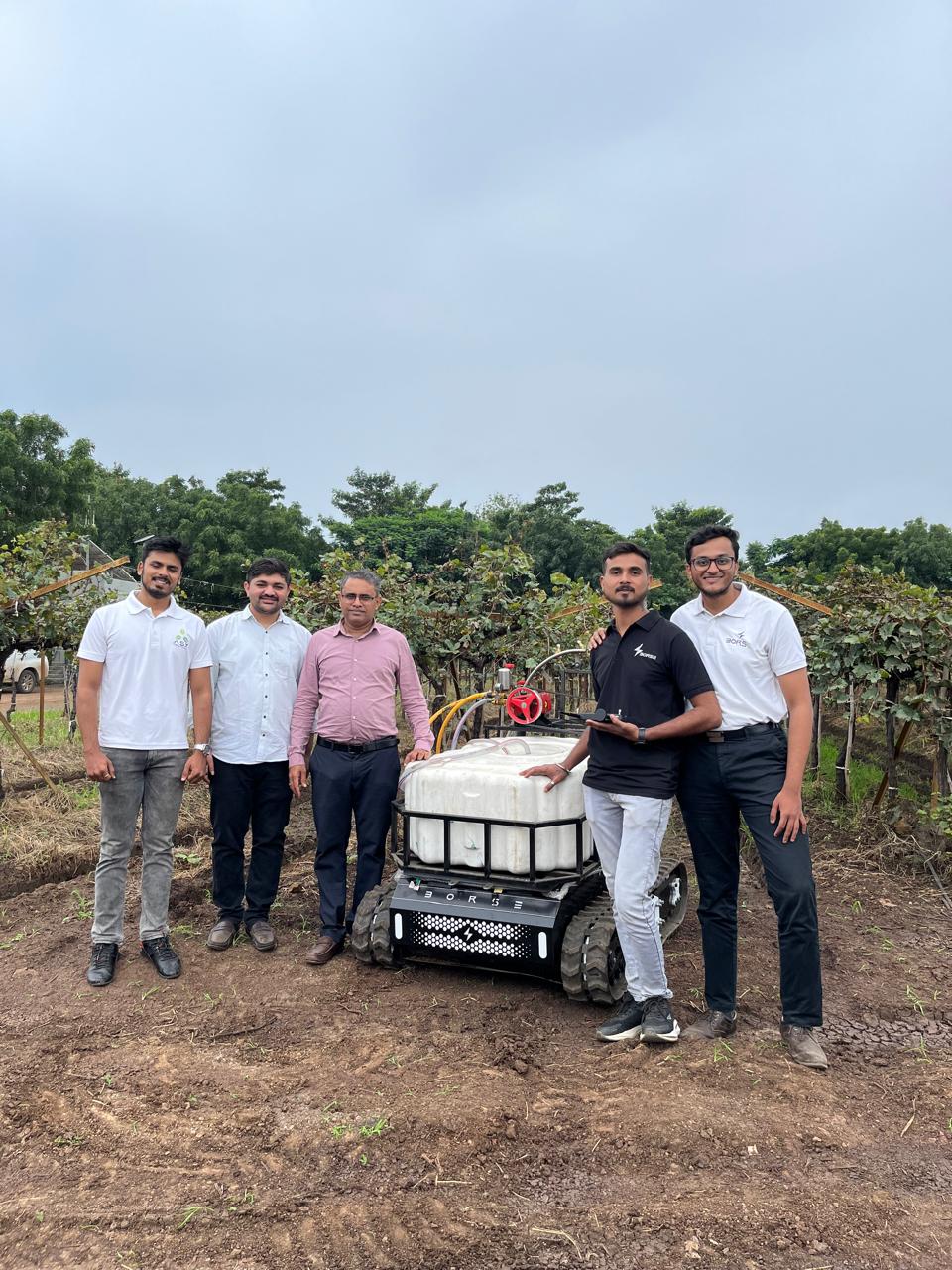 Borse Automotive field team with the ASSIST vineyard sprayer